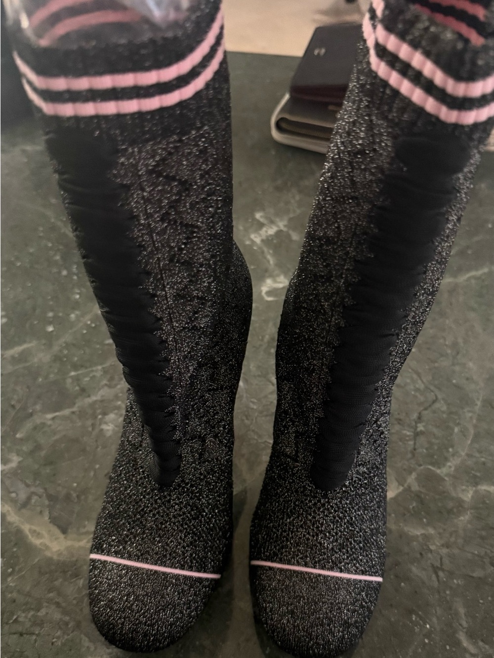 Heels or Heeled Boots (likely Heels)